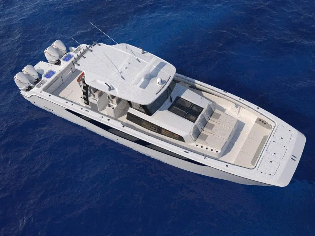 High-performance white motorboat with multiple engines gliding over deep blue water, showcasing sleek design and spacious deck.
